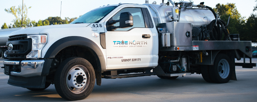 Man working next to TrueNorth truck